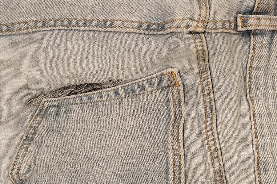 ripped jeans back pocket